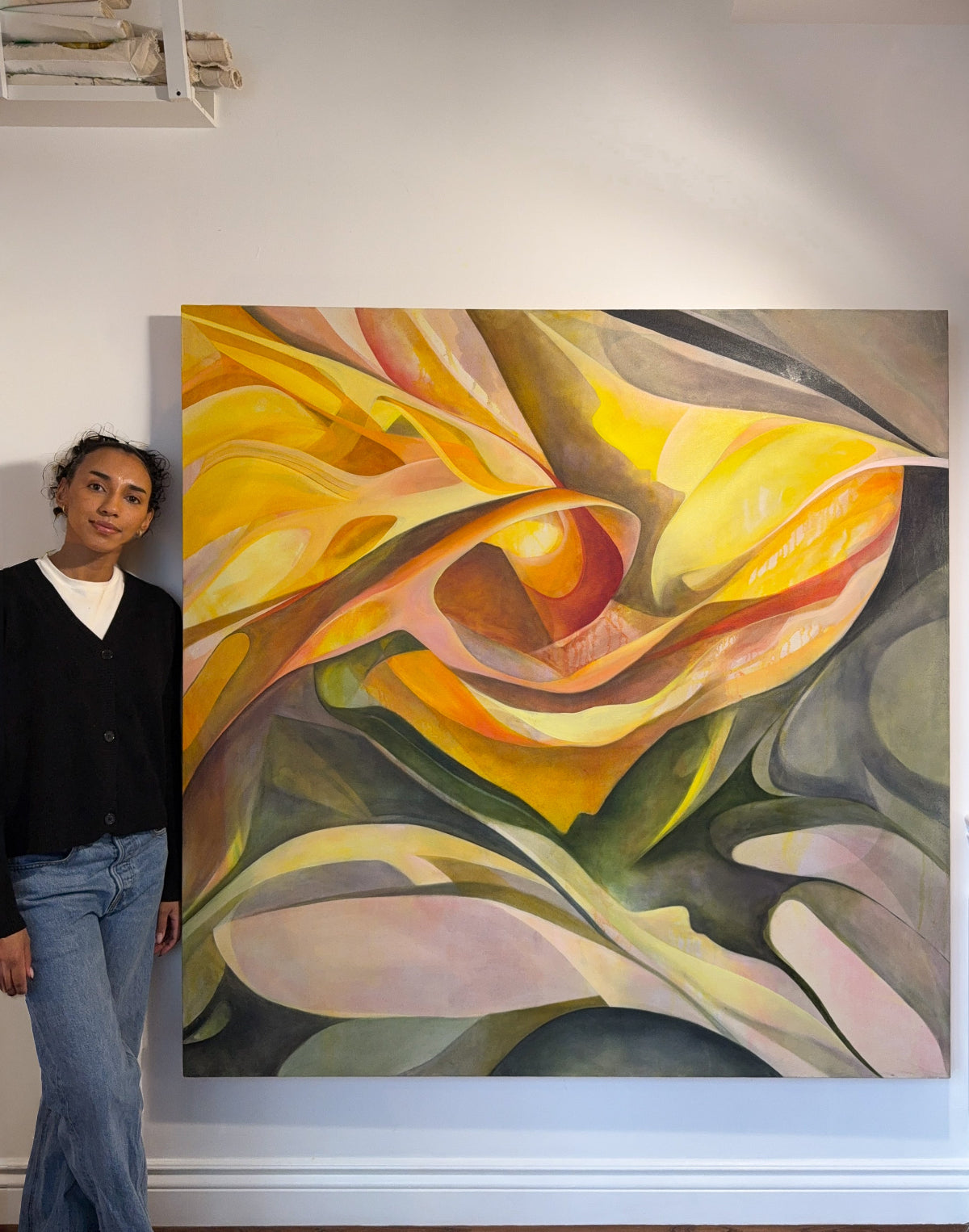 Original Artwork: Unfolding with artist Mya Naidoo, oil on canvas, a single flower fills the canvas, its form softened by late sunlight