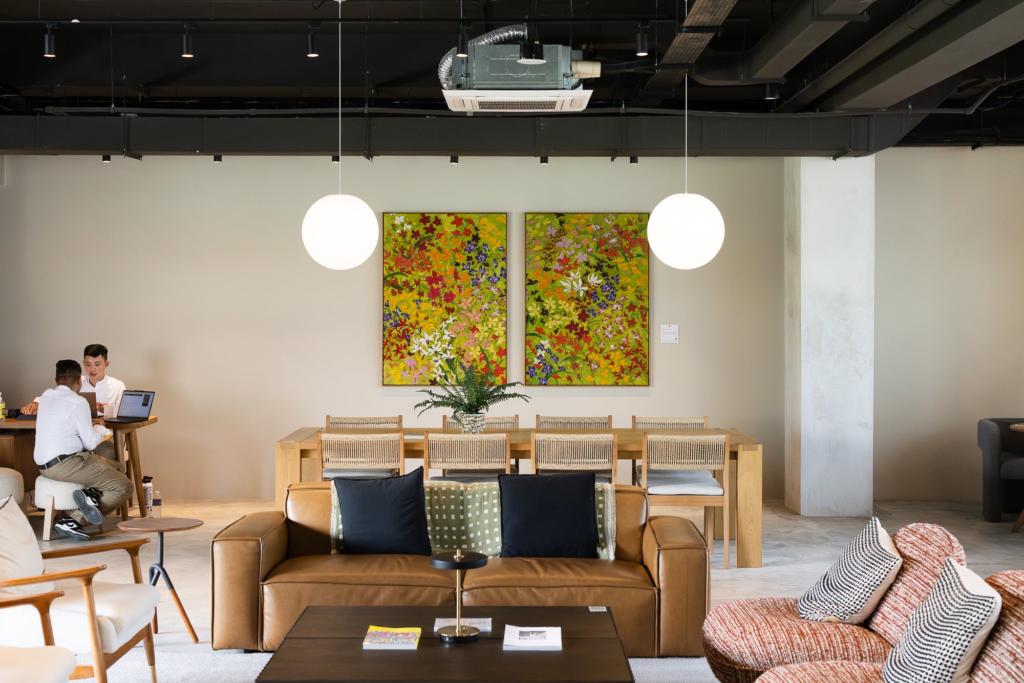 Hero Image featuring Diptych: Orchids in the Wind I & Orchids in the Wind II by Tia Avila, capturing the breathless movement of nature in a garden of orchids, showcased at Alma House, New Bahru, Singapore